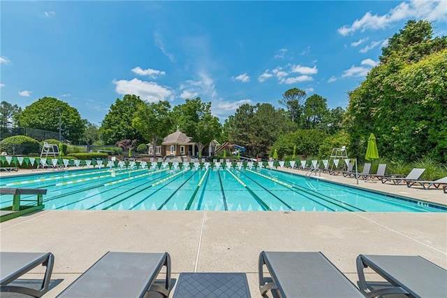 community pool featuring a patio area