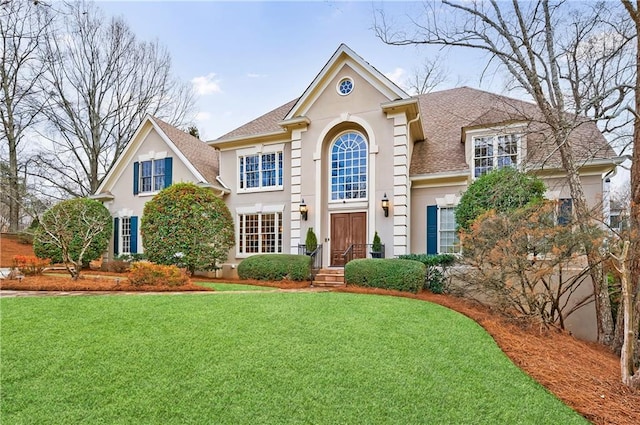 view of front facade featuring a front yard