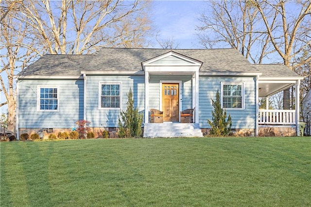 view of front facade with covered porch and a front yard