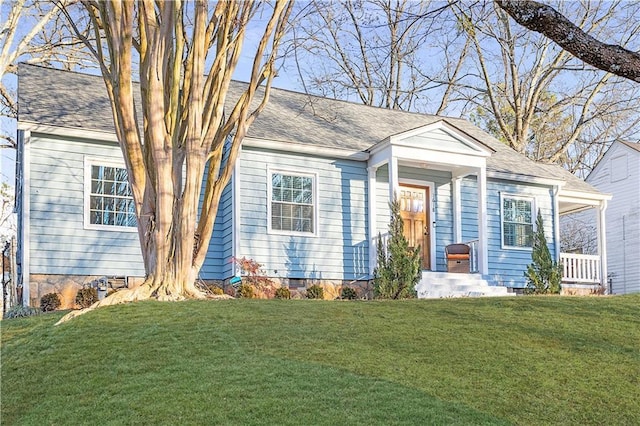 view of front of property with a front lawn