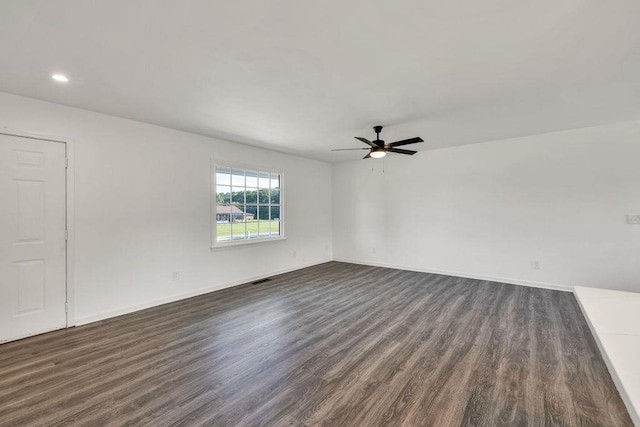 716 Phillips Dr, Monroe, GA 30656 - unfurnished room with dark wood-type flooring, ceiling fan, baseboards, and recessed lighting