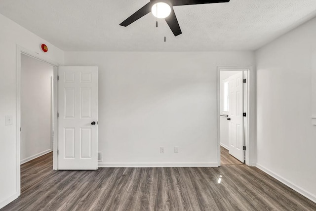 716 Phillips Dr, Monroe, GA 30656 - empty room featuring wood finished floors, ceiling fan, and baseboards