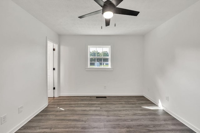 716 Phillips Dr, Monroe, GA 30656 - spare room featuring a ceiling fan, wood finished floors, baseboards, and a textured ceiling