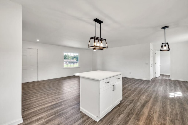 716 Phillips Dr, Monroe, GA 30656 - kitchen featuring open floor plan, dark wood-type flooring, white cabinets, and recessed lighting