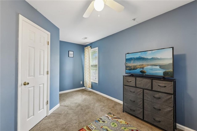 7077 Biltmore Trce, Lithonia, GA 30058 - unfurnished bedroom featuring carpet flooring, baseboards, and a ceiling fan