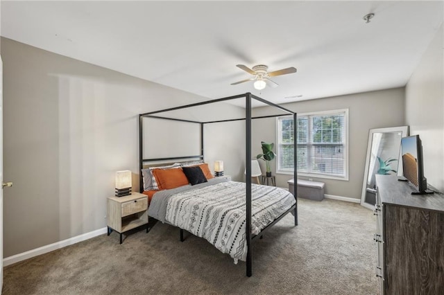 7077 Biltmore Trce, Lithonia, GA 30058 - carpeted bedroom with baseboards and a ceiling fan