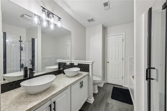 7077 Biltmore Trce, Lithonia, GA 30058 - full bath featuring a shower stall, toilet, tile patterned floors, double vanity, and a bathtub
