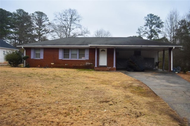 ranch-style house featuring a carport and a front lawn