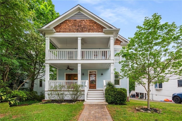315 Melrose Ave, Decatur, GA 30030 - neoclassical / greek revival house with covered porch, a front lawn, ceiling fan, and a balcony
