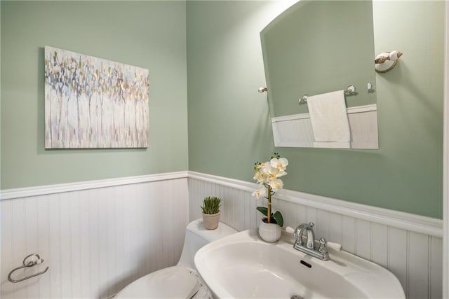 315 Melrose Ave, Decatur, GA 30030 - bathroom with wainscoting, toilet, and a sink