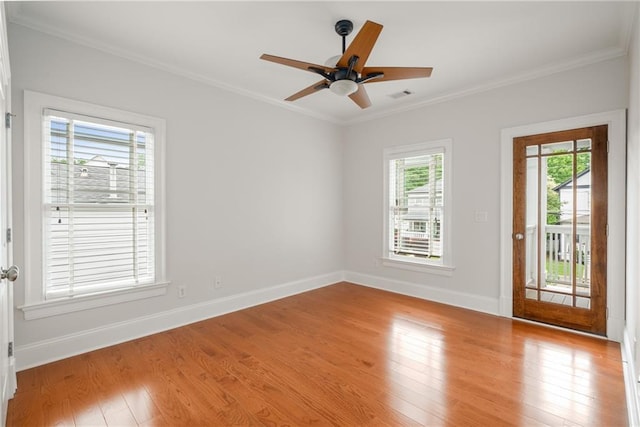 315 Melrose Ave, Decatur, GA 30030 - spare room with ornamental molding, visible vents, light wood finished floors, and baseboards