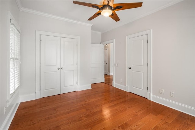315 Melrose Ave, Decatur, GA 30030 - unfurnished bedroom with ornamental molding, ceiling fan, baseboards, and light wood-style floors