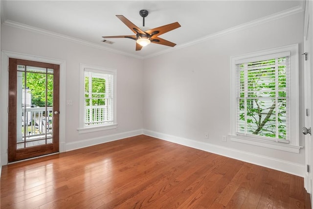 315 Melrose Ave, Decatur, GA 30030 - empty room with wood finished floors, visible vents, ornamental molding, and baseboards
