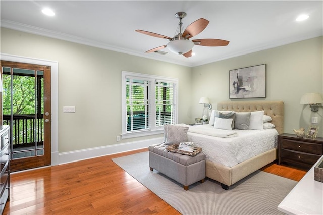 315 Melrose Ave, Decatur, GA 30030 - bedroom with wood finished floors, crown molding, access to outside, and baseboards