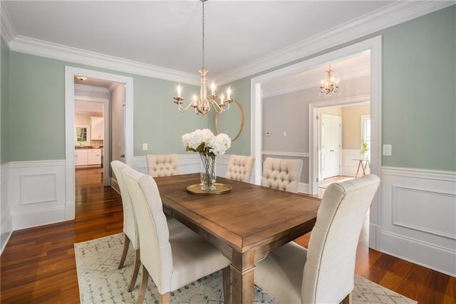 315 Melrose Ave, Decatur, GA 30030 - dining area with wainscoting, ornamental molding, an inviting chandelier, and wood finished floors