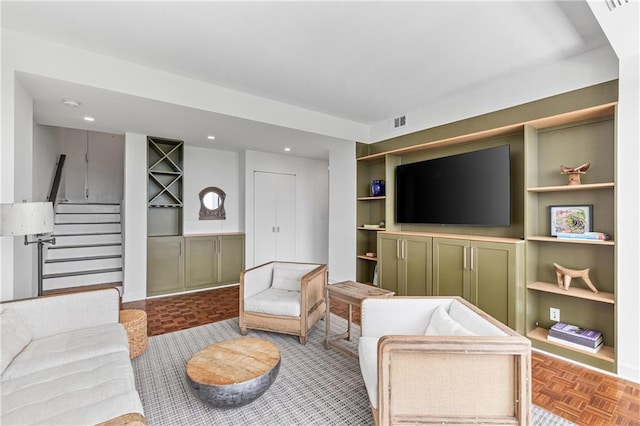 145 15th St NE Unit 1209, Atlanta, GA 30309 - living room featuring stairs, built in features, and recessed lighting