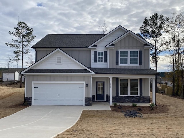 craftsman-style home featuring a porch and a garage