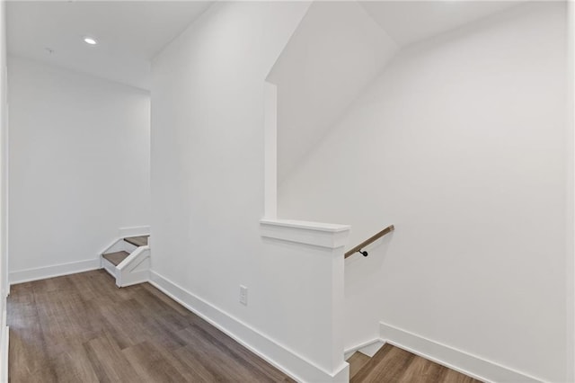 clothes washing area featuring hardwood / wood-style floors