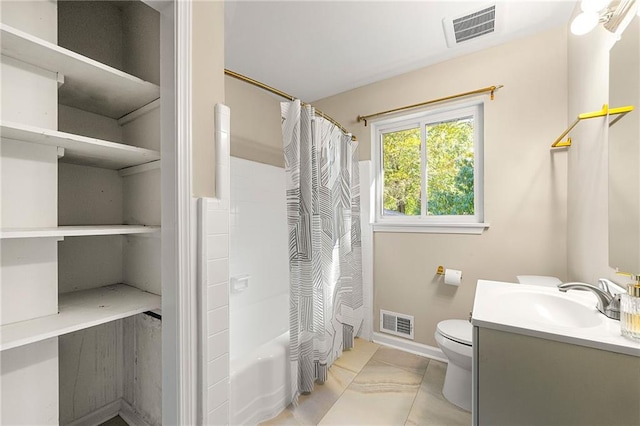 full bathroom with toilet, shower / tub combo, vanity, and tile patterned floors