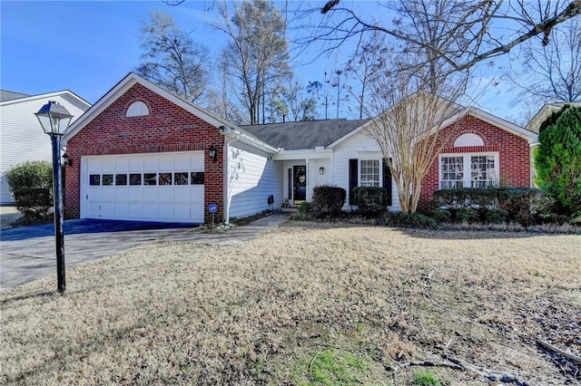 ranch-style home featuring a garage