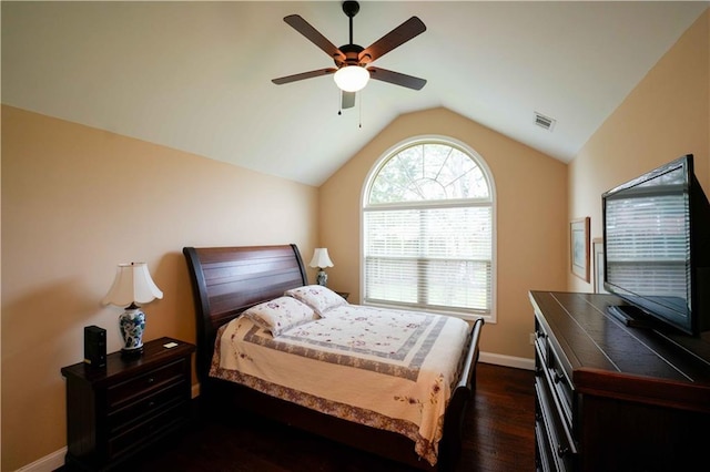 bedroom with lofted ceiling, baseboards, dark wood finished floors, and a ceiling fan