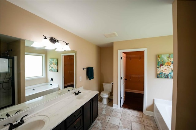 full bath with toilet, a garden tub, double vanity, baseboards, and a shower with door