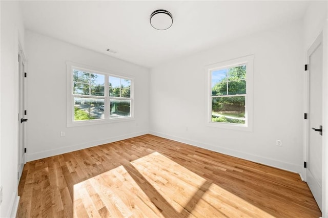 327 Ohm Ave, Avondale Estates, GA 30002 - unfurnished bedroom featuring light wood-style flooring and baseboards
