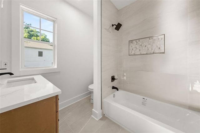 327 Ohm Ave, Avondale Estates, GA 30002 - full bath featuring baseboards, toilet, vanity, and  shower combination