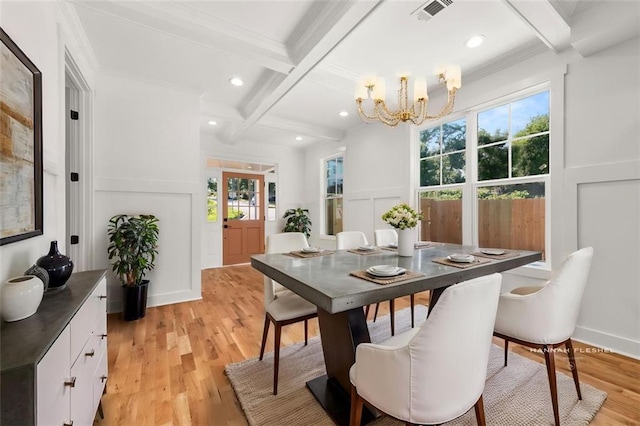 327 Ohm Ave, Avondale Estates, GA 30002 - dining room with a decorative wall, beamed ceiling, coffered ceiling, a chandelier, and plenty of natural light