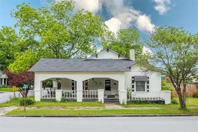 229 Slate St, Rockmart, GA 30153 - bungalow-style house with a porch, a chimney, and roof with shingles