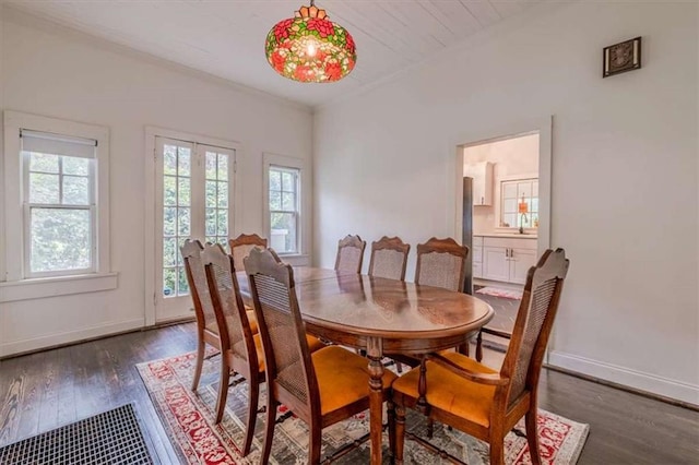 229 Slate St, Rockmart, GA 30153 - dining room featuring dark wood-style flooring and baseboards