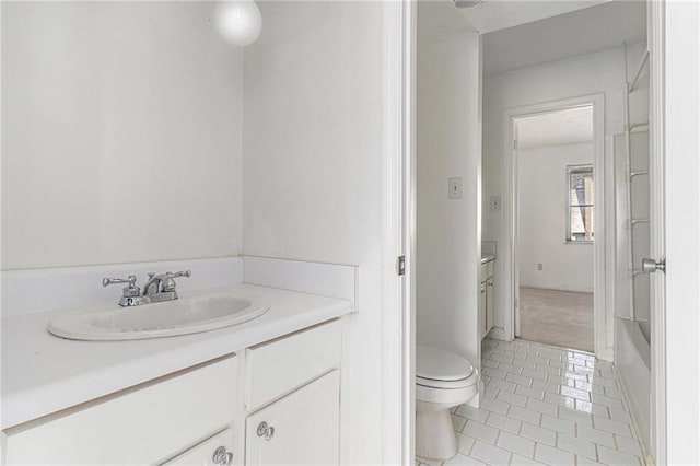 full bath with toilet, tile patterned flooring, shower / bathing tub combination, and vanity