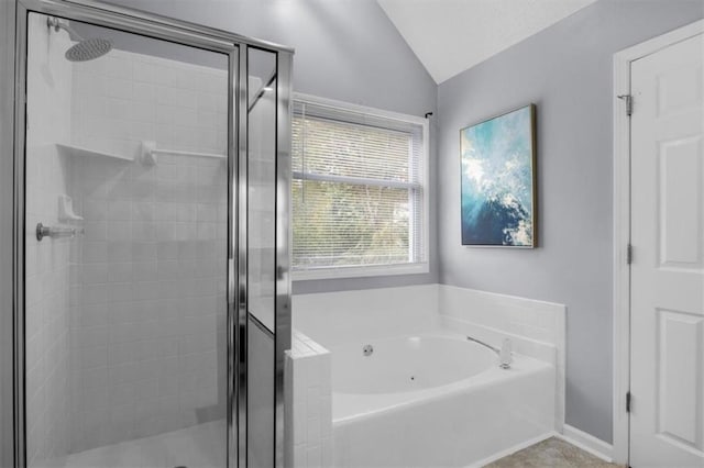 full bath with lofted ceiling, baseboards, a garden tub, and a shower stall