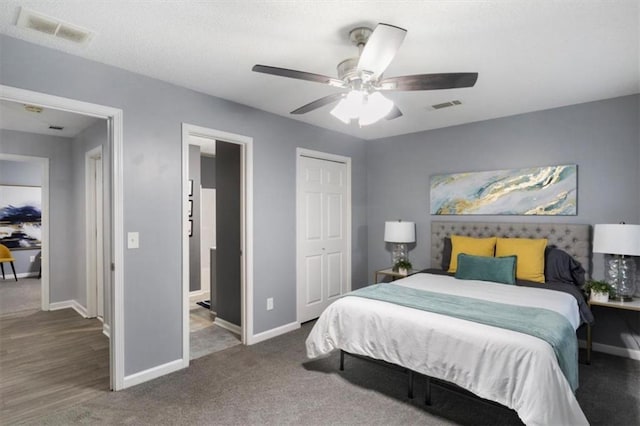 bedroom with ceiling fan, visible vents, and baseboards