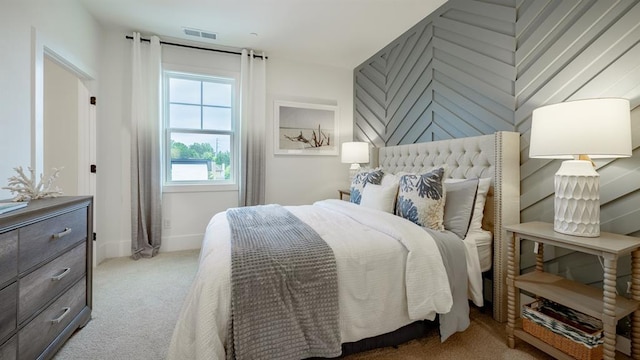 bedroom featuring carpet flooring and baseboards
