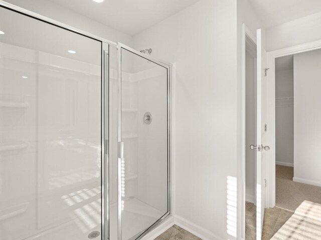 bedroom featuring carpet floors, visible vents, and baseboards