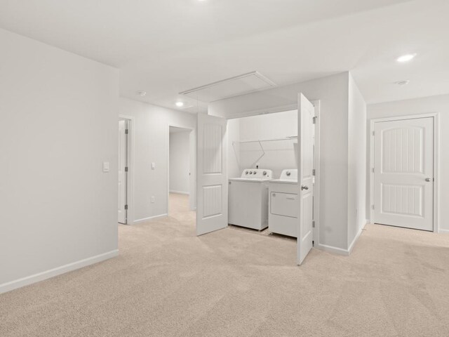 hall with carpet, visible vents, and baseboards