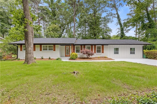 3614 N Druid Hills Rd N, Decatur, GA 30033 - view of front of home featuring board and batten siding and a front lawn