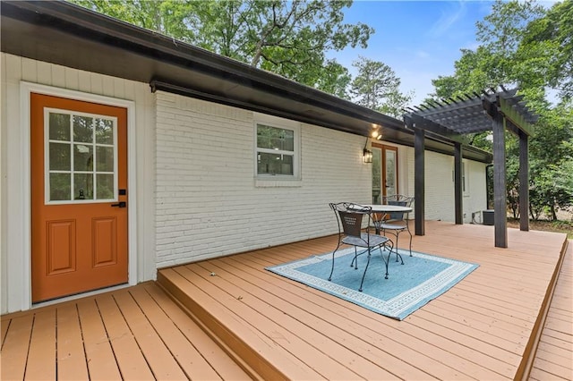 3614 N Druid Hills Rd N, Decatur, GA 30033 - wooden deck with a pergola, french doors, and outdoor dining space