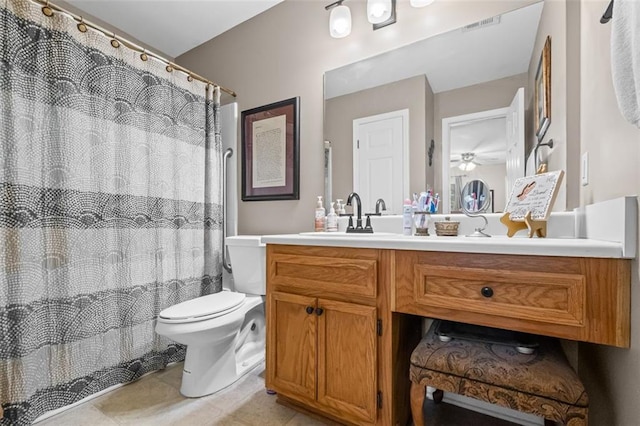 202 Berkeley Woods Dr, Duluth, GA 30096 - full bathroom featuring vanity, toilet, tile patterned flooring, ceiling fan, and a shower with curtain