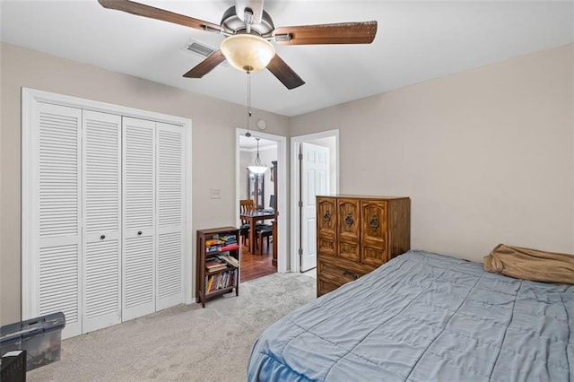 202 Berkeley Woods Dr, Duluth, GA 30096 - carpeted bedroom featuring a closet and ceiling fan