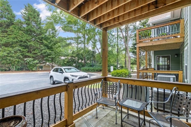 202 Berkeley Woods Dr, Duluth, GA 30096 - balcony featuring view of scattered trees and central AC unit