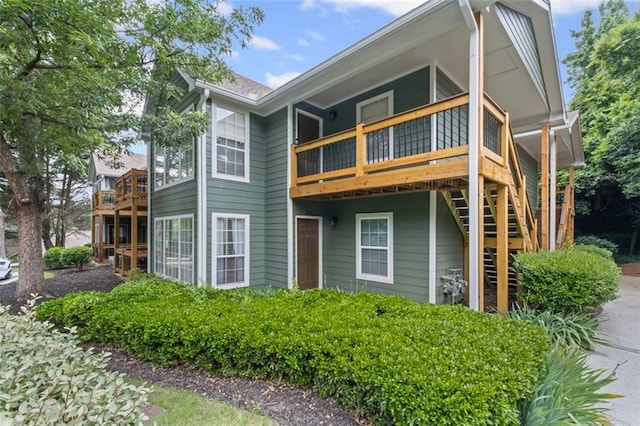 202 Berkeley Woods Dr, Duluth, GA 30096 - rear view of house with stairs and a deck