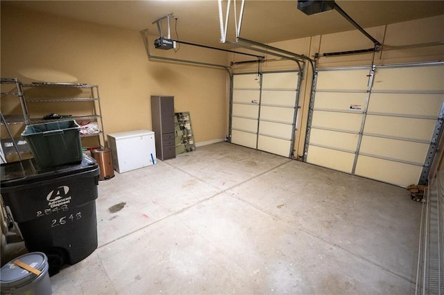 2548 Gadsen Walk, Duluth, GA 30097 - garage featuring a garage door opener