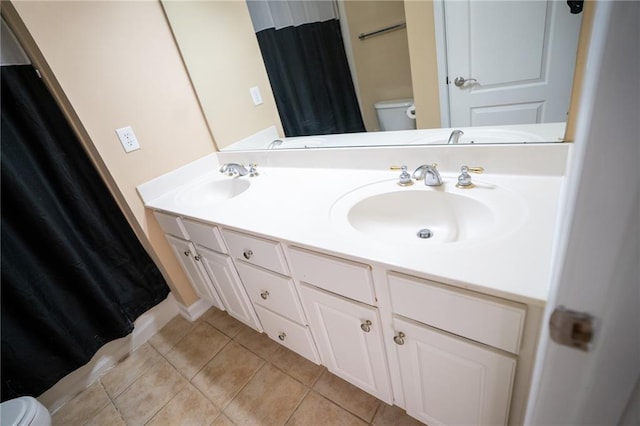 2548 Gadsen Walk, Duluth, GA 30097 - full bathroom with toilet, tile patterned flooring, a sink, and double vanity
