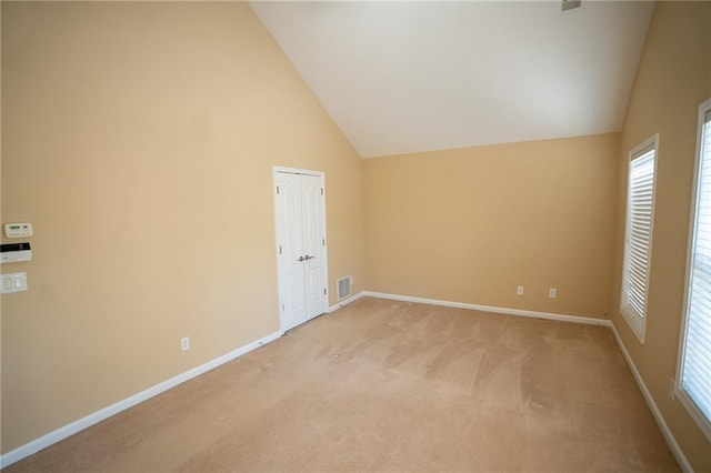 2548 Gadsen Walk, Duluth, GA 30097 - interior space featuring high vaulted ceiling, light carpet, visible vents, and baseboards
