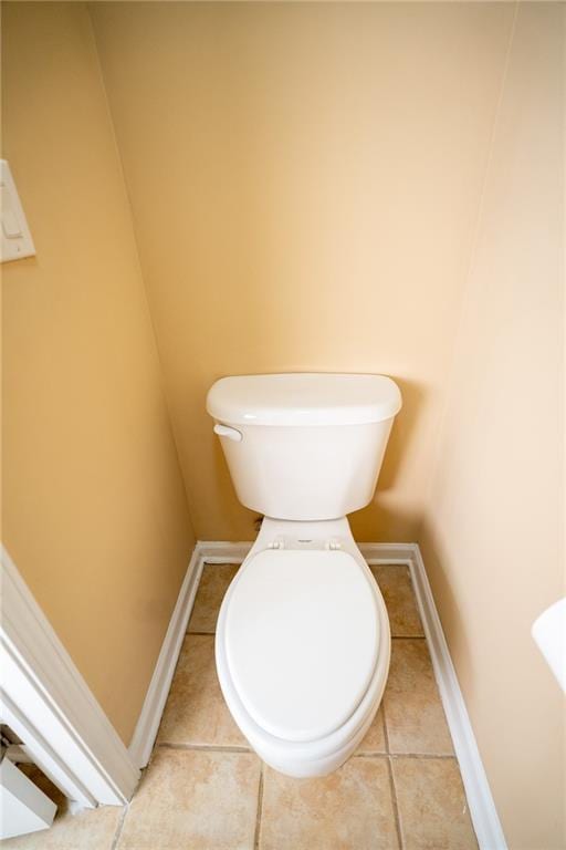 2548 Gadsen Walk, Duluth, GA 30097 - bathroom featuring baseboards, tile patterned flooring, and toilet