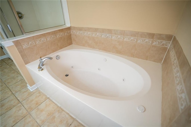 2548 Gadsen Walk, Duluth, GA 30097 - bathroom with a tub with jets and tile patterned floors