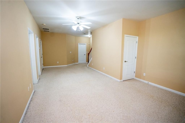 2548 Gadsen Walk, Duluth, GA 30097 - spare room with light carpet, baseboards, visible vents, and ceiling fan