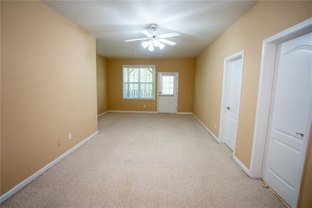 2548 Gadsen Walk, Duluth, GA 30097 - empty room with ceiling fan, light carpet, and baseboards
